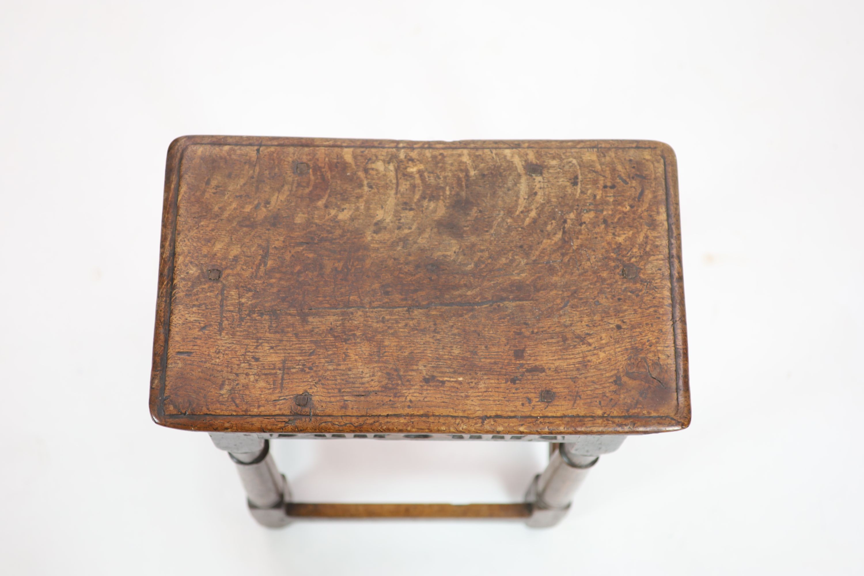 A Charles II oak joint stool, H 57cm. W 46cm. D 34cm.